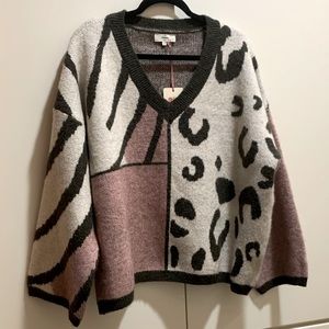 Entro V-Neck Sweater in Black, White, and Pink